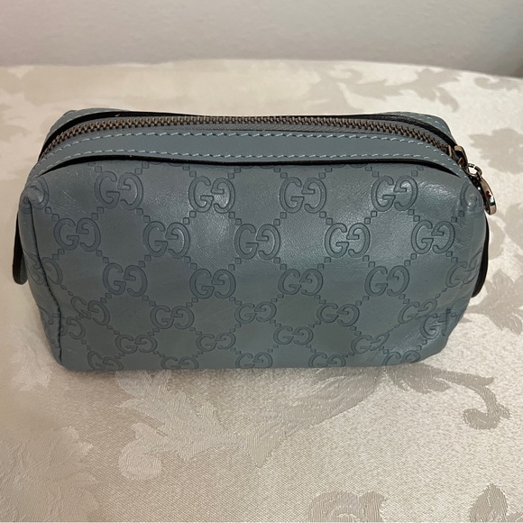 Gucci - authentic cosmetic pouch. Pairs beautifully with my Blue Coach handbag. - Picture 3 of 12